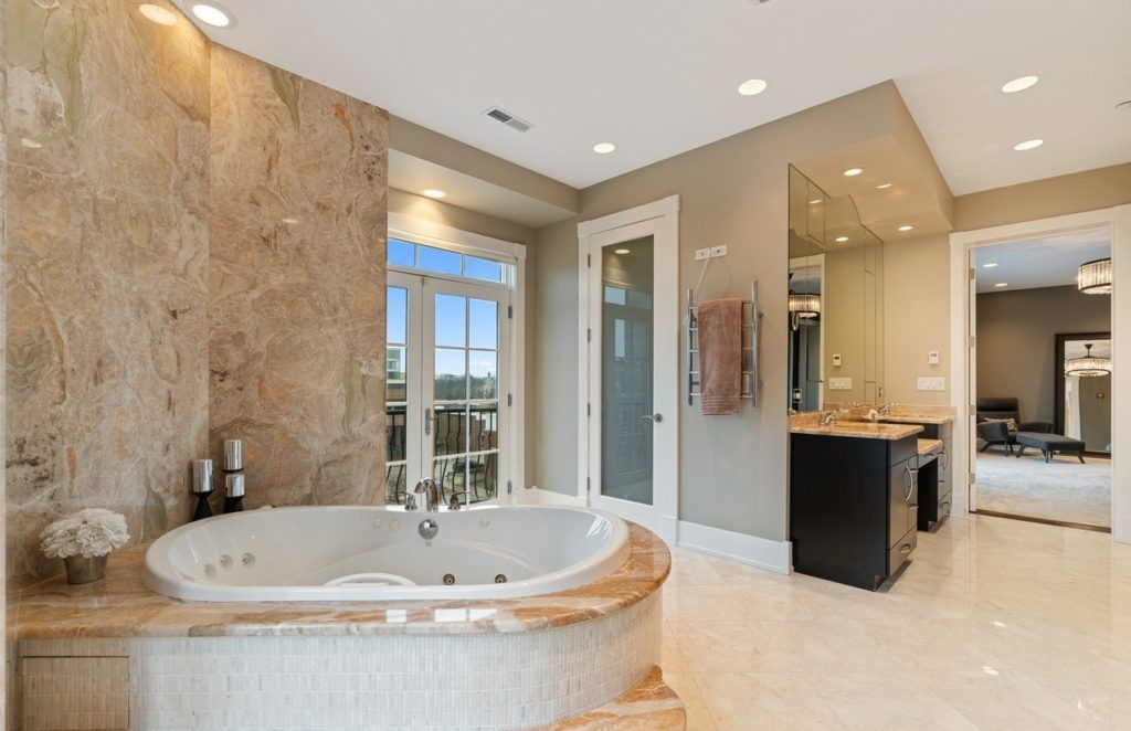 a large bathroom with a large tub